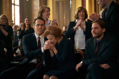 (L-R) RYAN REYNOLDS, HELEN MIRREN, and DANIEL BRUHL star in WOMAN IN GOLD