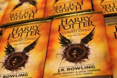 Piles of the new Harry Potter script book "Harry Potter and the Cursed Child Parts One & Two" are pictured inside Waterstones bookshop on Piccadilly in central London early in the morning of July 31, 2016, during the midnight party celebrating the publication of "Harry Potter and the Cursed Child Parts One & Two" script book. Harry Potter fans were buzzing with excitement Saturday as "Harry Potter and the Cursed Child", a stage play that imagines the fictional boy wizard as a grown-up father of three, opened in London. The script will be released in Britain at midnight on Saturday (2300 GMT), with bookshops planning to stay open into the wee small hours to satisfy the desires of Potter fans. July 31 is the birthday of both Rowling and Potter. / AFP / Daniel Leal-Olivas (Photo credit should read DANIEL LEAL-OLIVAS/AFP/Getty Images)